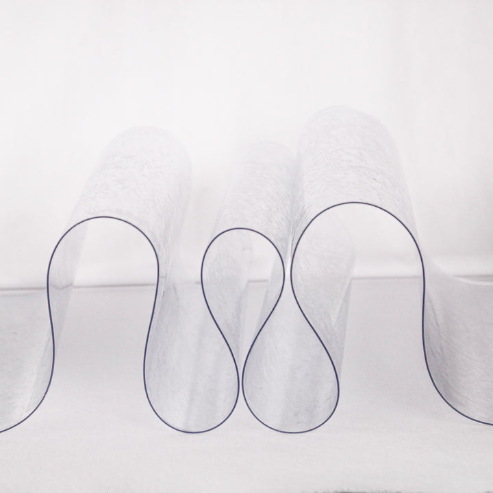 40 gauge transparent plastic vinyl sheeting, close view of drape and clarity | FabricLA
