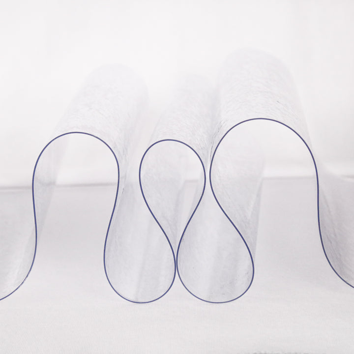 40 gauge clear vinyl fabric draped to show extra heavy transparency | FabricLA