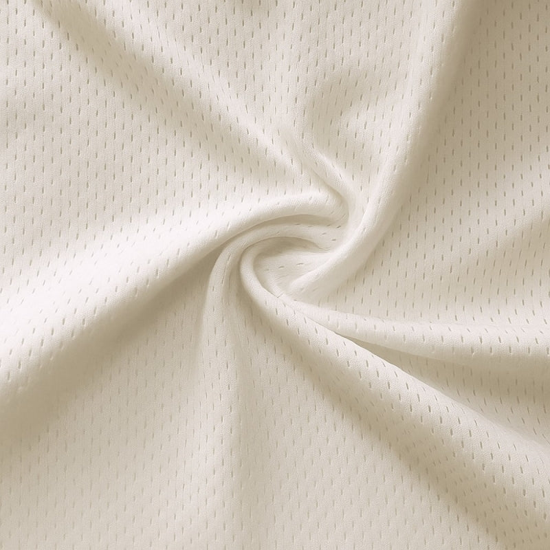 Athletic Pro Mesh Jersey fabric in Cream, sold by the yard