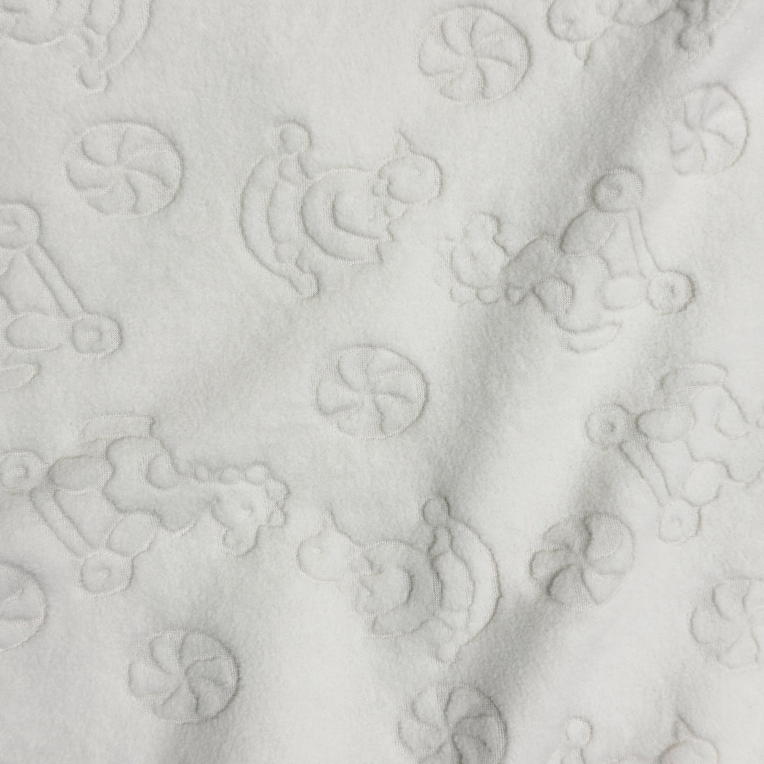 Embossed ivory baby toys stretch fleece swatch