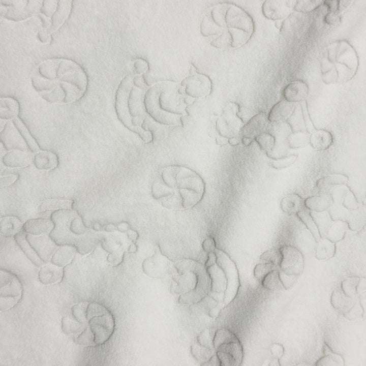 Embossed ivory baby toys stretch fleece swatch