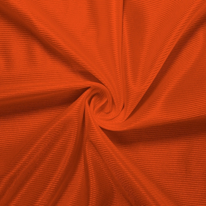 Athletic Dazzle Polyester fabric in Orange, sold by the yard