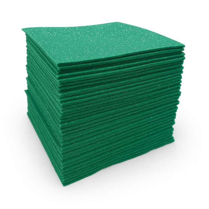 Kelly green glitter felt sheets stacked in a pre-cut pack for Christmas and DIY crafts.