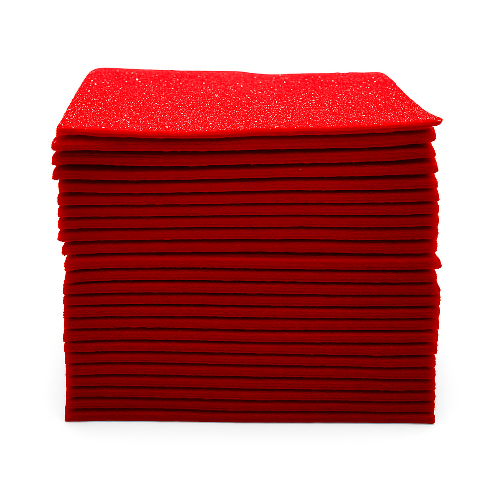 Red glitter felt sheets stacked in a pre-cut pack for DIY crafts and holiday projects.